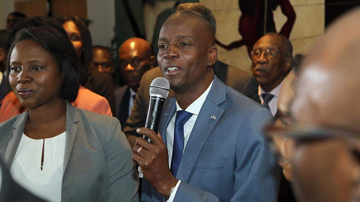 In this file photo, Haitian President Jovenel Moise, accompanied by his wife Martine Marie Etienne Joseph, speaks to a group of Haitians living in South Florida in 2017. Moise was assassinated at his home in 2021.